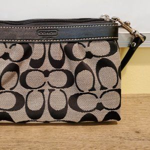 Coach dark brown signature canvas clutch